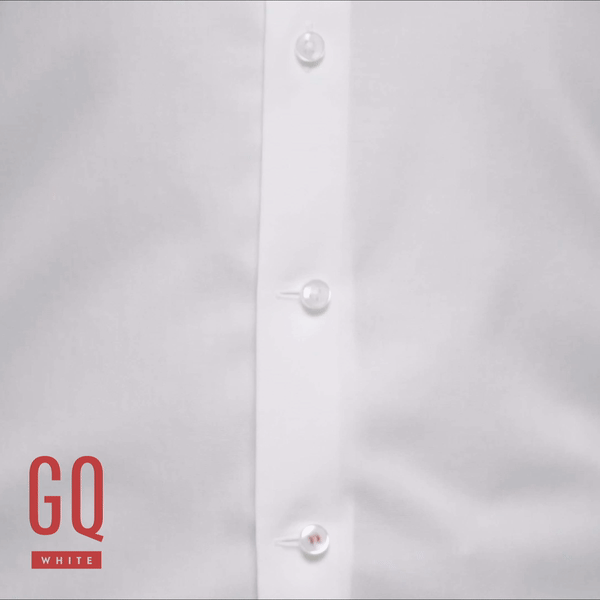 Moving image of GQWhite's Buffet Button expanding as the wearer's stomach expands, like they are very full after a big meal.