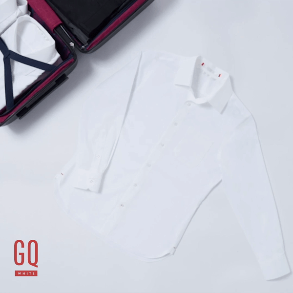 A GQWhite™ shirt folds and unfolds into a suitcase in this moving image.